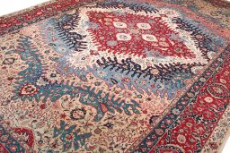 Corner detail of 1930s Tabriz rug showing border pattern and Wool pile