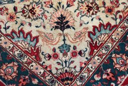 Backside of handmade 1930s Tabriz rug showing knot structure and weave density