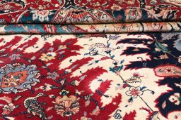 Close-up detail of 1930s Tabriz rug from Iran / Persia showing Wool weave