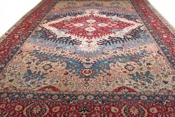 Surface texture of 1930s Tabriz rug with natural Wool and intricate pattern