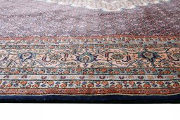 Close-up detail of 2000s Tabriz rug from Iran / Persia showing Wool weave