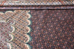Central medallion detail of 2000s Tabriz rug from Iran / Persia