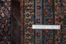 Close-up detail of 2000s Tabriz rug from Iran / Persia showing Wool weave