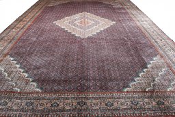 Close-up detail of 2000s Tabriz rug from Iran / Persia showing Wool weave