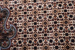 Close-up detail of New Tabriz rug from Iran / Persia showing Wool weave