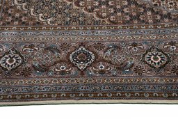 Surface texture of New Tabriz rug with natural Wool and intricate pattern