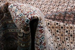 Central medallion detail of New Tabriz rug from Iran / Persia
