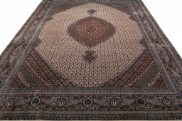 Surface texture of New Tabriz rug with natural Wool and intricate pattern