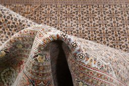 Surface texture of New Tabriz rug with natural Wool and intricate pattern