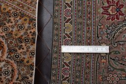 Central medallion detail of New Tabriz rug from Iran / Persia