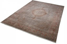 Close-up detail of New Tabriz rug from Iran / Persia showing Wool weave