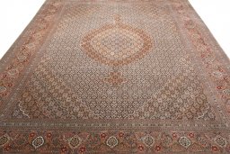 Surface texture of New Tabriz rug with natural Wool and intricate pattern