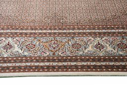 Close-up detail of New Tabriz rug from Iran / Persia showing Cork weave