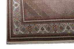Surface texture of New Tabriz rug with natural Cork and intricate pattern