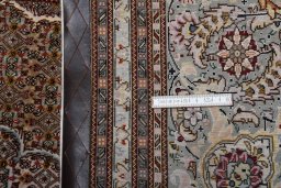 Close-up detail of New Tabriz rug from Iran / Persia showing Cork weave