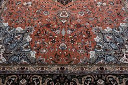 Backside of handmade New Tabriz rug showing knot structure and weave density