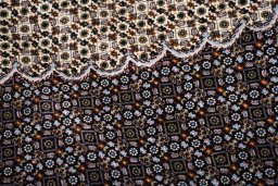 Corner detail of New Tabriz rug showing border pattern and Cork pile