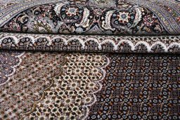 Close-up detail of New Tabriz rug from Iran / Persia showing Cork weave