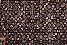 Close-up detail of New Tabriz rug from Iran / Persia showing Cork weave