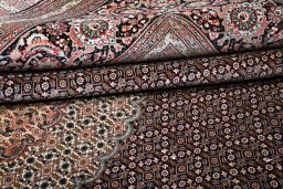 Close-up detail of New Tabriz rug from Iran / Persia showing Cork weave