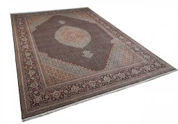 Corner detail of New Tabriz rug showing border pattern and Cork pile