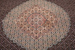 Central medallion detail of New Tabriz rug from Iran / Persia
