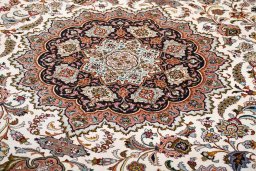 Corner detail of New Tabriz rug showing border pattern and Cork pile