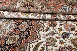 Central medallion detail of New Tabriz rug from Iran / Persia