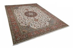 Corner detail of New Tabriz rug showing border pattern and Cork pile