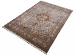 Close-up detail of New Tabriz rug from Iran / Persia showing Cork weave