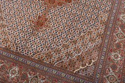 Close-up detail of New Tabriz rug from Iran / Persia showing Cork weave