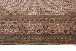 Corner detail of New Tabriz rug showing border pattern and Cork pile