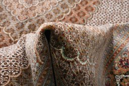 Surface texture of New Tabriz rug with natural Cork and intricate pattern