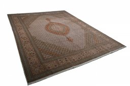 Corner detail of New Tabriz rug showing border pattern and Cork pile