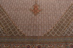 Backside of handmade New Tabriz rug showing knot structure and weave density