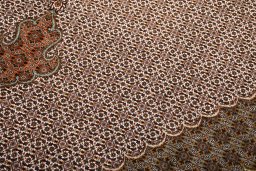 Close-up detail of New Tabriz rug from Iran / Persia showing Cork weave