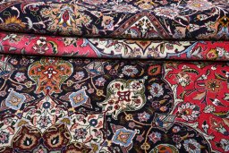 Close-up detail of 2000s Tabriz rug from Iran / Persia showing Cork weave
