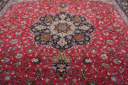 Backside of handmade 2000s Tabriz rug showing knot structure and weave density