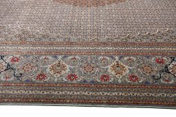 Corner detail of New Tabriz rug showing border pattern and Cork pile