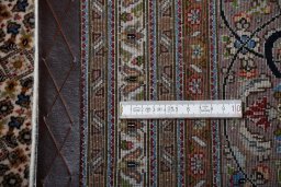 Central medallion detail of New Tabriz rug from Iran / Persia