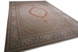 Corner detail of New Tabriz rug showing border pattern and Cork pile