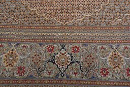 Backside of handmade New Tabriz rug showing knot structure and weave density