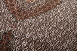 Corner detail of New Tabriz rug showing border pattern and Cork pile