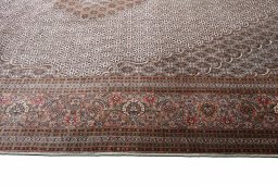 Close-up detail of New Tabriz rug from Iran / Persia showing Cork weave