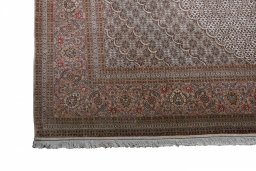 Surface texture of New Tabriz rug with natural Cork and intricate pattern