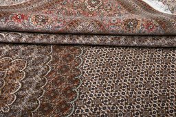 Central medallion detail of New Tabriz rug from Iran / Persia