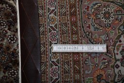 Close-up detail of New Tabriz rug from Iran / Persia showing Cork weave