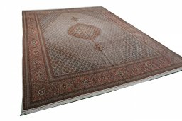 Corner detail of New Tabriz rug showing border pattern and Cork pile