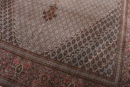 Close-up detail of New Tabriz rug from Iran / Persia showing Cork weave