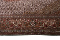 Corner detail of New Tabriz rug showing border pattern and Cork pile